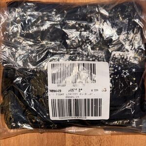 SOLD…Victoria’s Secret limited Blk &platinum silver Star Patterned Garment